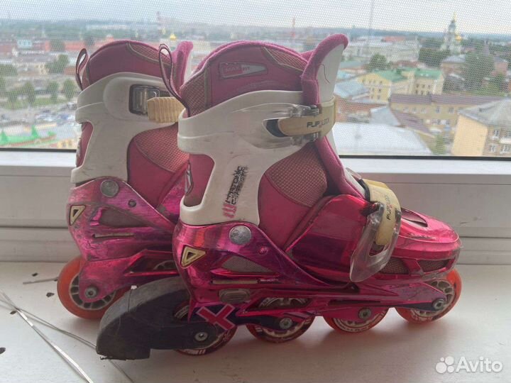 Роликовые коньки