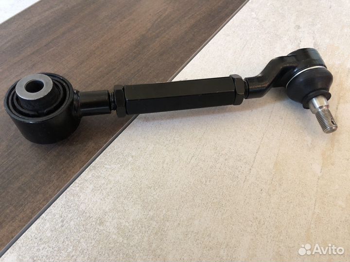 Задний верхний развальный регулируемый рычаг