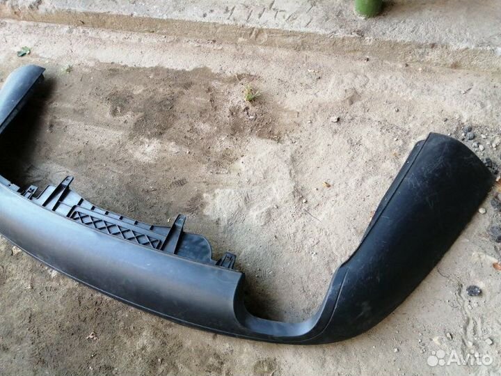 Спойлер (юбка) бампера задний Volkswagen Passat B6