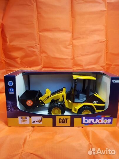 Игрушки Bruder новый трактор погрузчик CAT