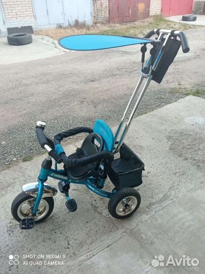 Детский трехколесный велосипед с ручкой