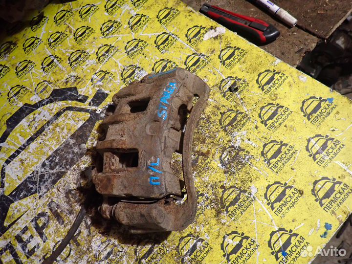 Суппорт передний левый Hyundai Starex H1