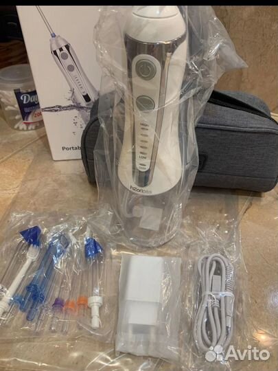 Ирригатор портативный с насадками для полости рта