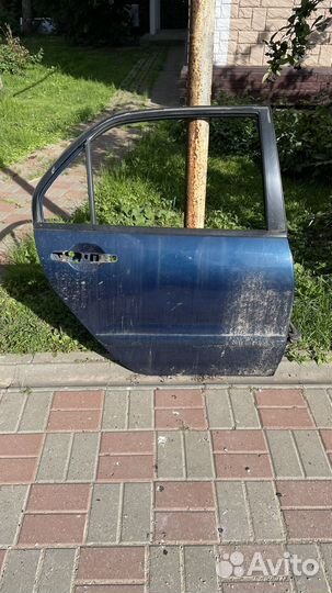 Дверь задняя правая lancer 9
