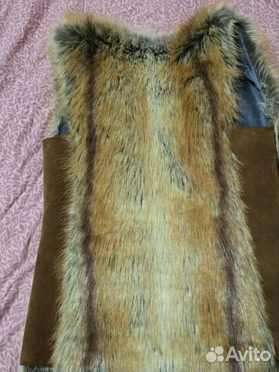 Меховая жилетка
