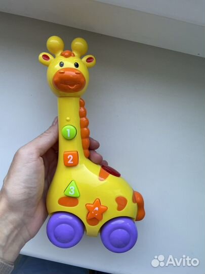 Игрушка музыкальная жирафик