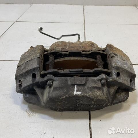 Суппорт передний левый Land Rover Defender 110 L31