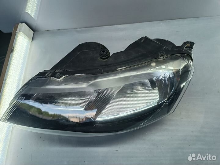 Фара левая Skoda Rapid