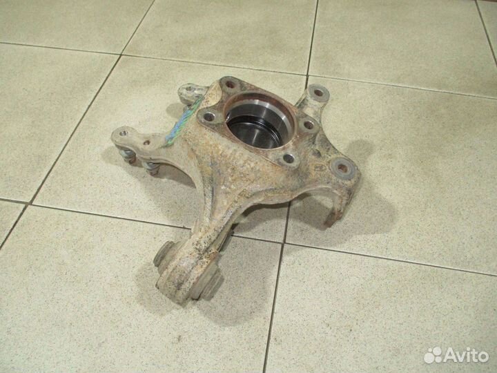 Кулак поворотный задний левый Kia Sportage 3 (SL)