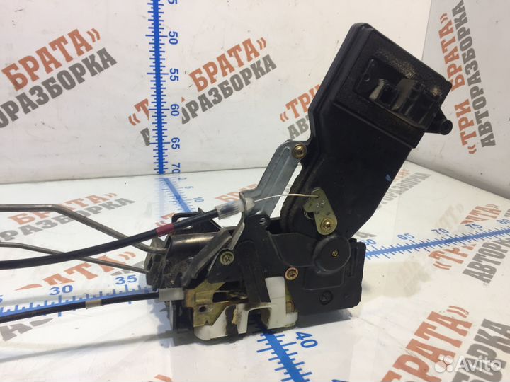 Мазда 6 Замок передней двери Лев