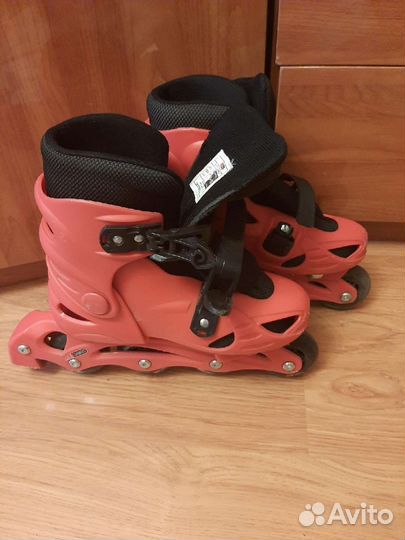 Роликовые коньки