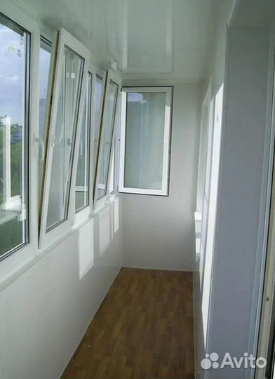 Остекление балкона с отделкой