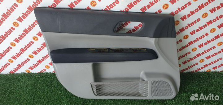 Обшивка боковой двери передняя левая Subaru