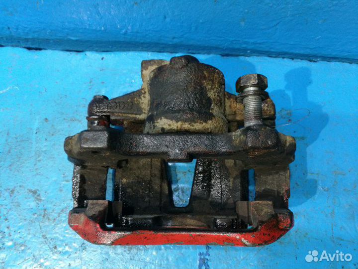 Суппорт передний левый Опель Корса Д