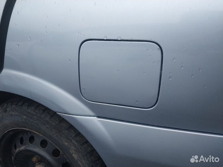 Лючок бака Nissan Almera N16