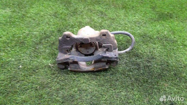 Суппорт тормозной передний правый Opel Corsa D