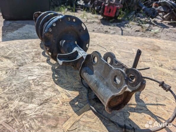 Стойка передняя левая Kia Sportage 4 QL