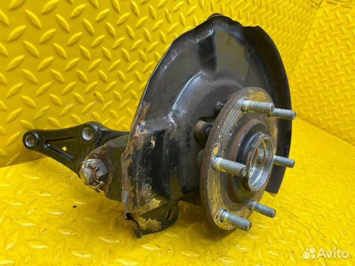 Кулак поворотный передний Mitsubishi Pajero Sport