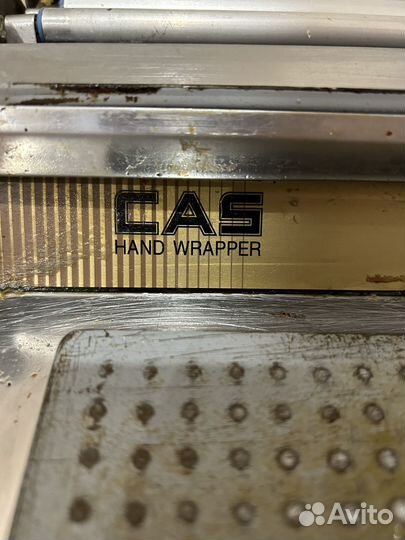 Горячий стол. Упаковщик аппарат