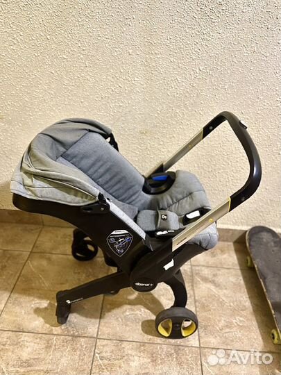 Детское автокресло коляска doona
