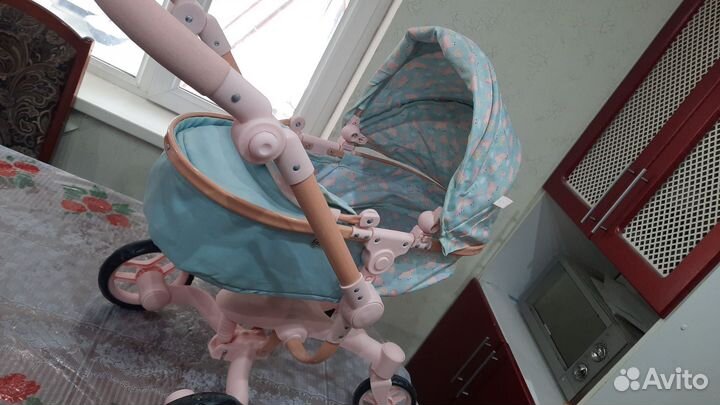 Игрушечная коляска для кукол