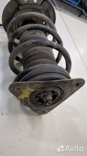 Амортизатор подвески левый передний Nissan Rogue