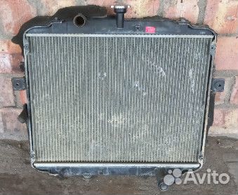 Радиатор основной 253104F110 б.у