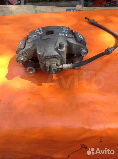 Суппорт тормозной передний правый Nissan Teana L3