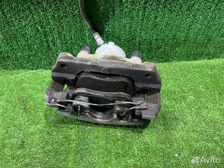 Суппорт тормозной передний левый Renault Duster