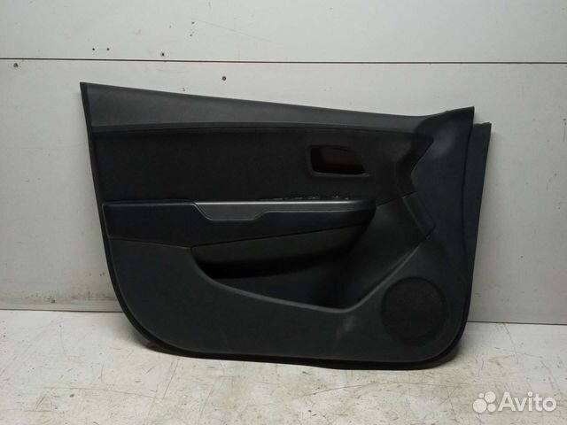 Обшивка двери передней левой Kia Rio 3