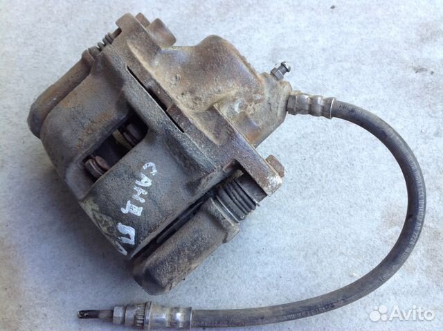 Суппорт тормозной передний левый Рено