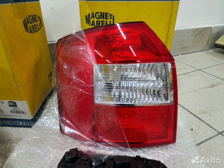 Задний левый фонарь новый Vag Audi A4 B6 Avant