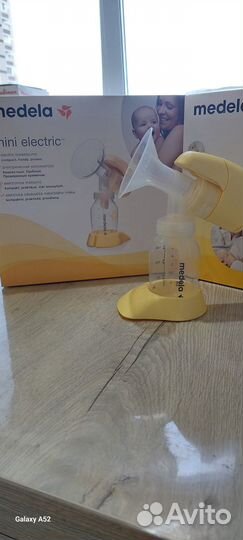 Молокоотсос medela mini electric