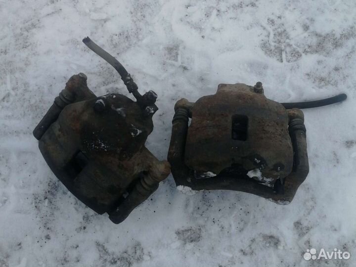 Суппорт тормозной передний левый правый ниссан аль