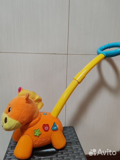 Игрушка каталка с ручкой