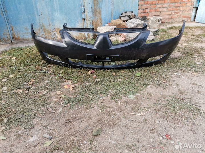 Передний бампер 