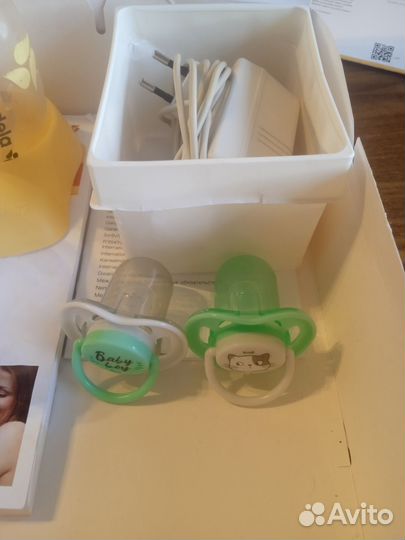 Молокоотсос medela электрический