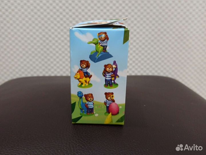 Игрушка Барни на динозавре