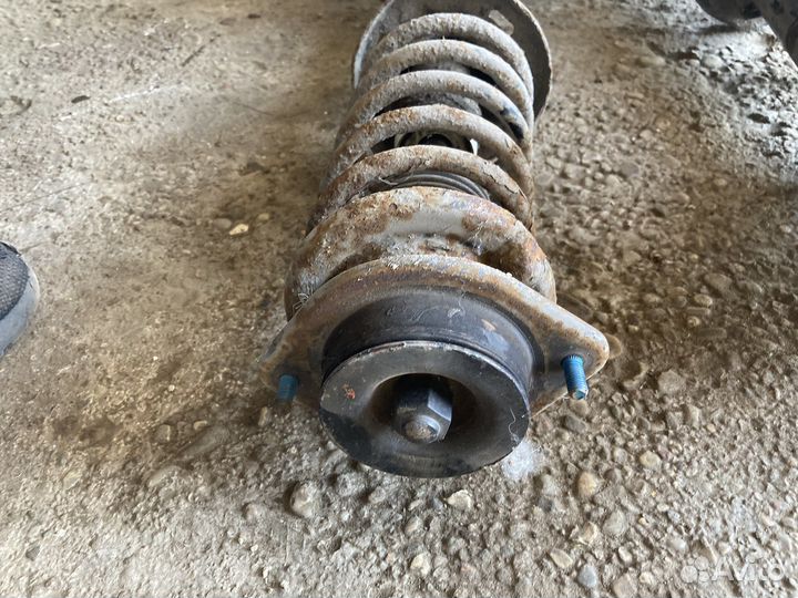 Передние стойки ford escort 92 год