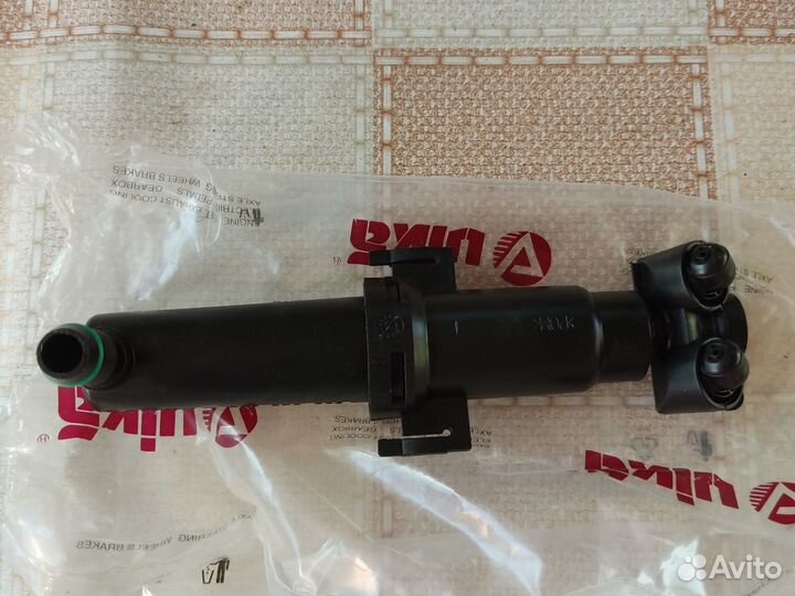 Форсунка омывателя фары tiguan