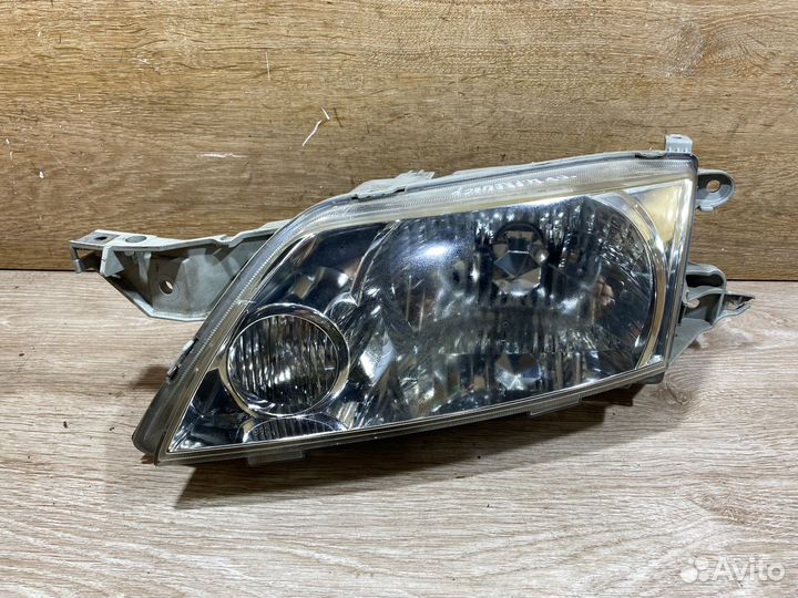 Фара передняя левая Mazda Premacy 1 рест 142331