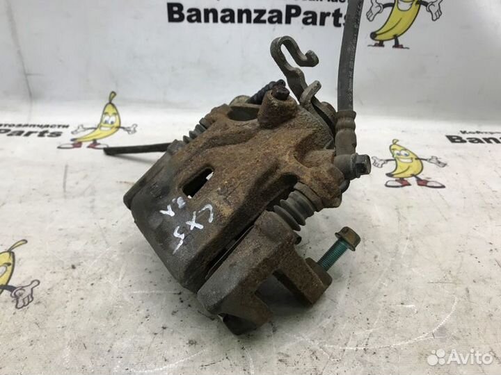 Суппорт тормозной задний левый Mazda Cx-5 KE