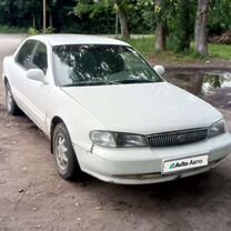 Kia Clarus 2.0 MT, 1997, битый, 142 196 км, с пробегом, цена 120 000 руб.