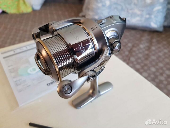 Катушка daiwa exist 2004 модельн. год 05