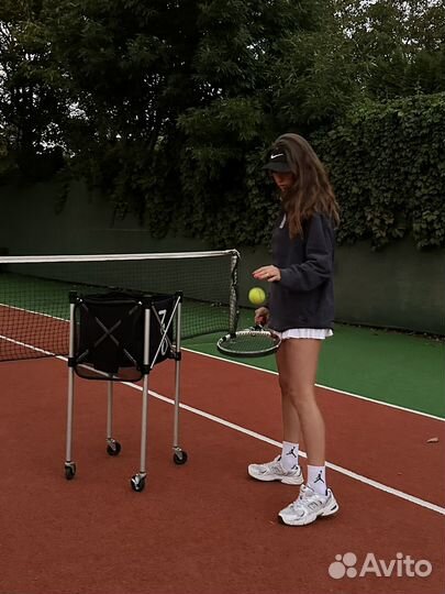 Тренер по большому теннису