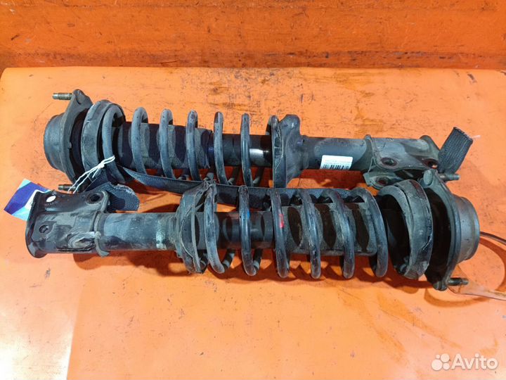 Амортизатор передний Mazda Demio DW3W