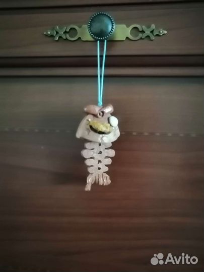 Глинянный колокольчик в виде острова рыбки