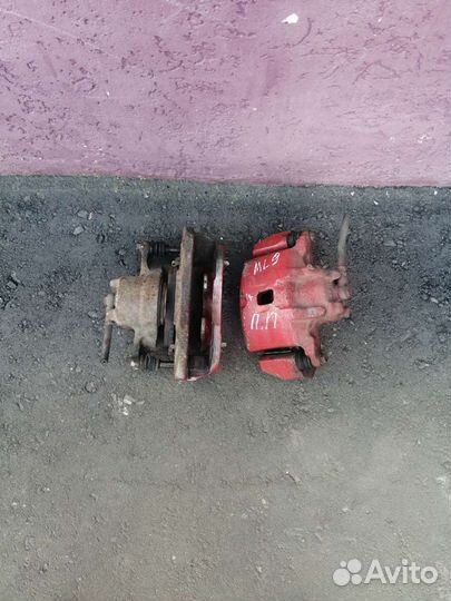 Суппорт передний (правый левый ) Mitsubishi Lancer