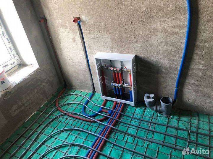 Монтаж системы отопления с тёплым полом в коттедже