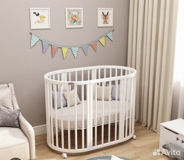 Детская кроватка с маятником круглая